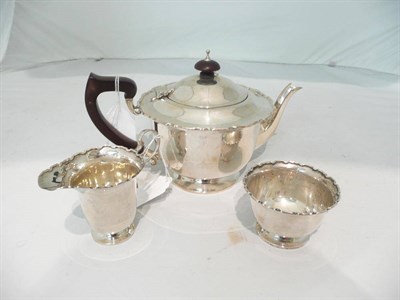 Lot 262 - A three piece silver teaset (3)