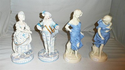 Lot 279 - A pair of Royal Worcester partially glazed blue and cream bisque figures of girls and a pair of...