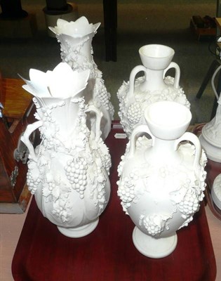 Lot 281 - Two pairs of Parian vases encrusted with fruiting vines