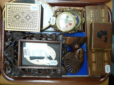 Lot 289 - Two framed portrait silhouettes, an Eastern carved head, a pair of gilt metal photograph...