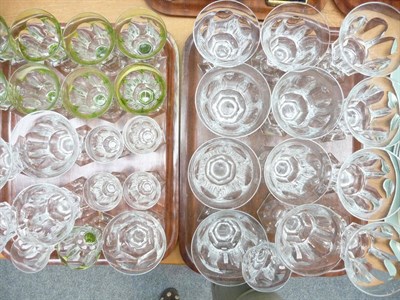 Lot 292 - A Victorian suite of panel cut glasses, some with green flashed decoration, on three trays