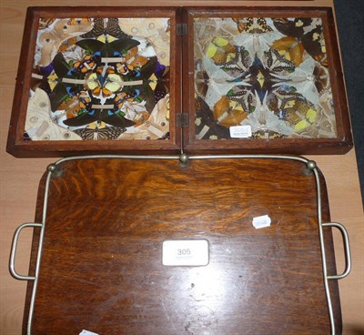 Lot 305 - An oak tray and cased butterfly display