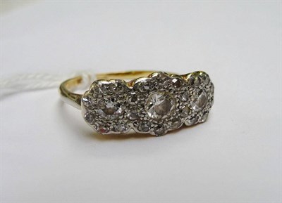 Lot 325 - A diamond triple cluster ring