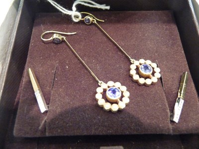 Lot 329 - A pair of diamond set bar earrings and a pair of sapphire and seed pearl drop earrings