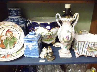 Lot 338 - A shelf of ceramics including a Faience planter, a large pottery jardiniere printed with panels...