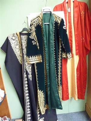 Lot 343 - An Arab ceremonial garment with gold embroidered design (Libya); Jordanian green velvet and...