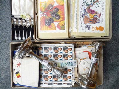 Lot 348 - Pair of silver plated candlesticks and six cased silver teaspoons; a quantity of stamps and service