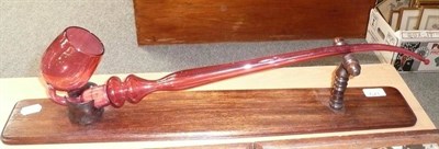 Lot 379 - Cranberry glass pipe