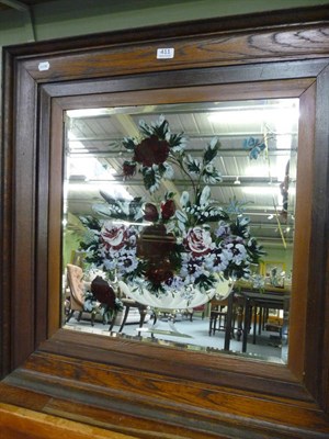 Lot 411 - An oak framed gypsy mirror painted with flowers