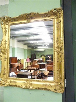 Lot 427 - A large gilt framed mirror.