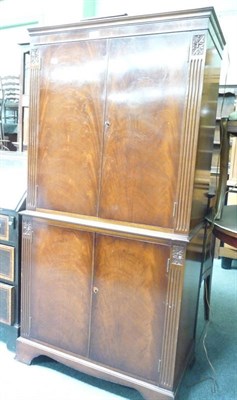 Lot 441 - A reproduction mahogany cocktail cabinet