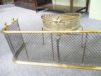 Lot 452 - Brass trivet and a spark guard