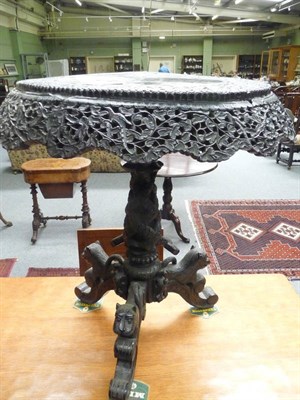 Lot 455 - Anglo-Indian carved wine table