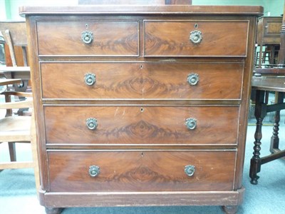 Lot 464 - A mahogany veneered chest of drawers