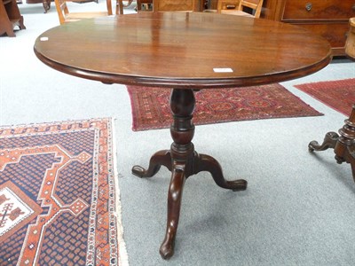 Lot 466 - George III mahogany tripod table