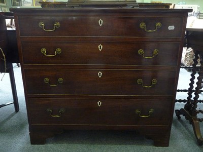 Lot 474 - A Georgian mahogany four height chest of drawers