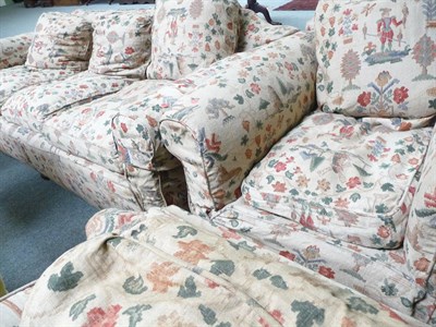 Lot 484 - A three piece suite with loose chintz covers