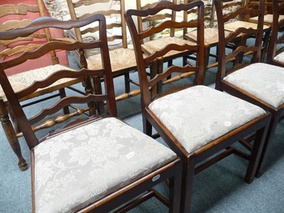 Lot 487 - A set of four mahogany ladder back dining chairs