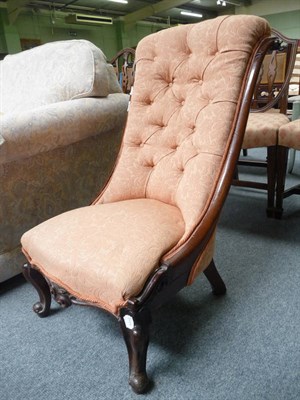 Lot 492 - A Victorian nursing chair and two footstools