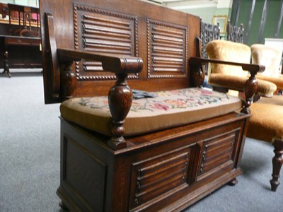 Lot 504 - An oak monk's bench