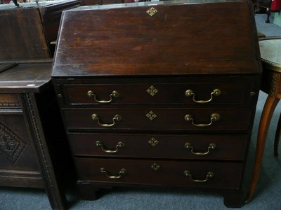 Lot 517 - George III stained bureau