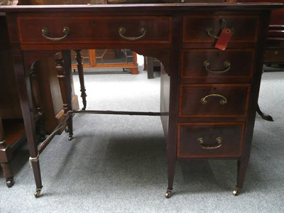 Lot 530 - An Edwardian cross-banded mahogany small desk