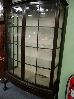 Lot 574 - Mahogany bow-front display cabinet