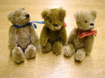 Lot 1010 - Three Miniature Schuco Brown Jointed Bears, 9cms.