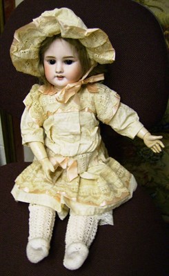 Lot 1016 - French SFBJ Bisque Socket Head Doll '60' with sleeping brown eyes, open mouth, original wig, on...