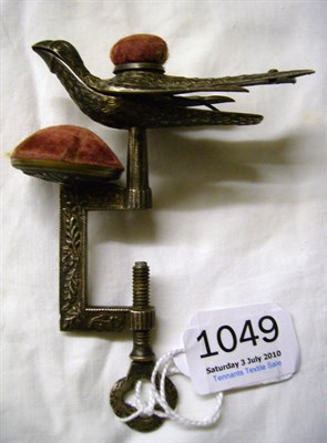 Lot 1049 - A White Metal and Brass Hemming Bird Clamp, with crimson velvet pin cushions.