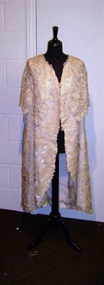 Lot 1129 - Late 19th Century Lace Evening Coat with cream silk lining; two Victorian gents waist coats;...