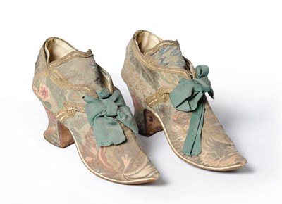 Lot 1136 - Pair of Early 18th Century Silk Brocade Ladies Shoes with pointed toes and green silk ribbon...