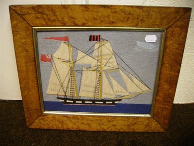 Lot 1151 - Maple Framed Wool Work Picture Of A Sailing Ship, 47cm by 39.5cms.