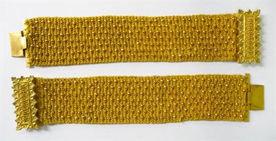 Lot 1140A - 19th Century Yellow Fabric Choker/Pair Of Bracelets with gilt metal bead decoration and clasps.