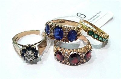 Lot 6 - A 9 carat gold diamond and sapphire cluster ring, two 9 carat gold dress rings and a garnet ring