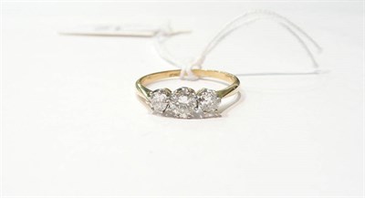 Lot 12 - A diamond three stone ring