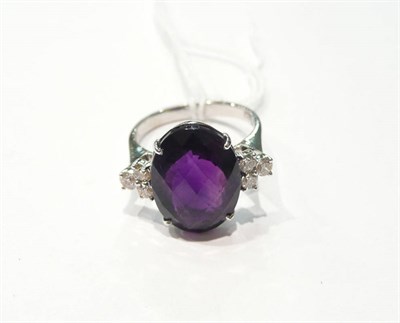 Lot 15 - A 14 carat white gold amethyst and diamond ring