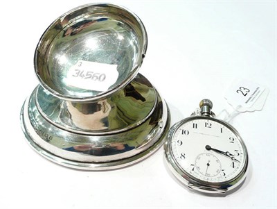 Lot 23 - A silver cased pocket watch and a watch stand