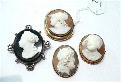Lot 24 - Three shell cameo brooches and another