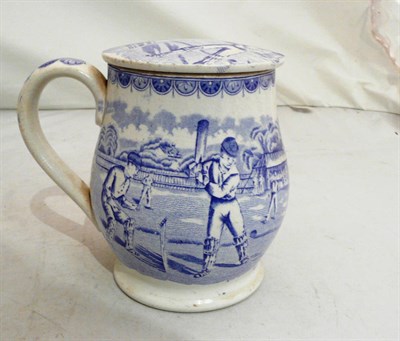 Lot 58 - A 19th century blue and white transfer printed mug (cricket interest)