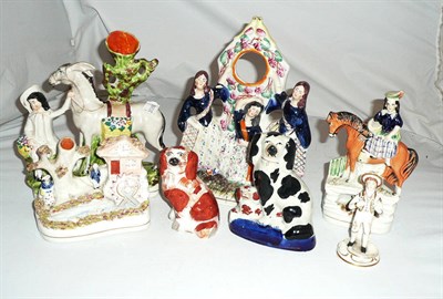 Lot 74 - Seven Staffordshire animals and figures