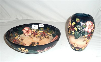 Lot 89 - Moorcroft blue ground ovoid vase and a matching fruit bowl