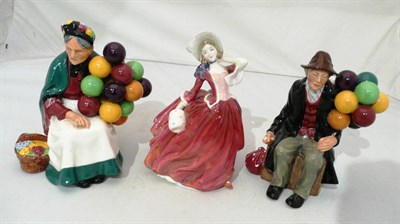 Lot 116 - Three Royal Doulton figures 'The Balloon Man' HN1954, 'The Old Balloon Seller' HN1315 and...