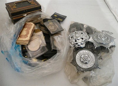 Lot 140 - A collection of coins and police badges, etc