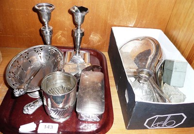 Lot 143 - A pair of loaded silver candlesticks (a.f.), a silver mug, napkin rings, perfume bottles, etc