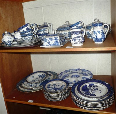 Lot 176 - Quantity of blue and white table wares on three shelves