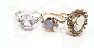 Lot 201 - A 9 carat white gold dress ring, an opal set dress ring and a citrine set dress ring (3)