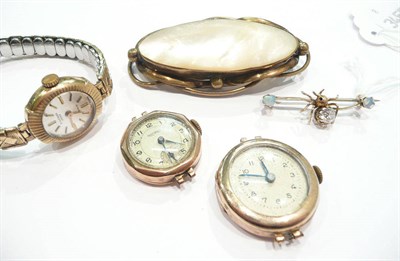 Lot 215 - A spider bar brooch, a lady's wristwatch, two cased watches and a mother of pearl brooch