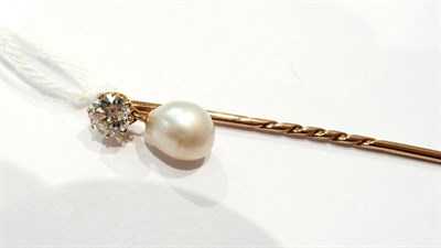 Lot 227 - A diamond and pearl stick pin