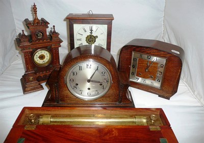 Lot 231 - Four mantel clocks and a military brass rolling rule